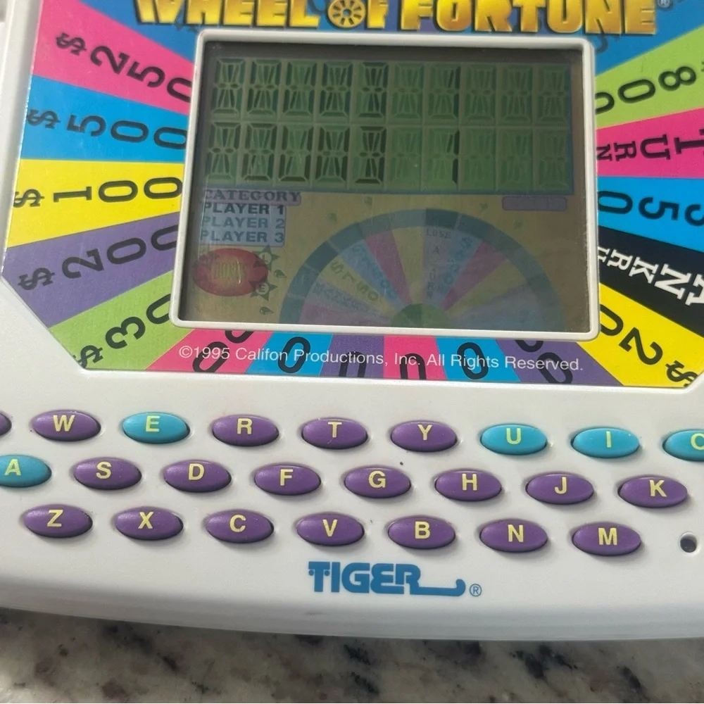 Tiger Wheel‎ of Fortune Handheld Game 1995 – Tested & Working with Sound